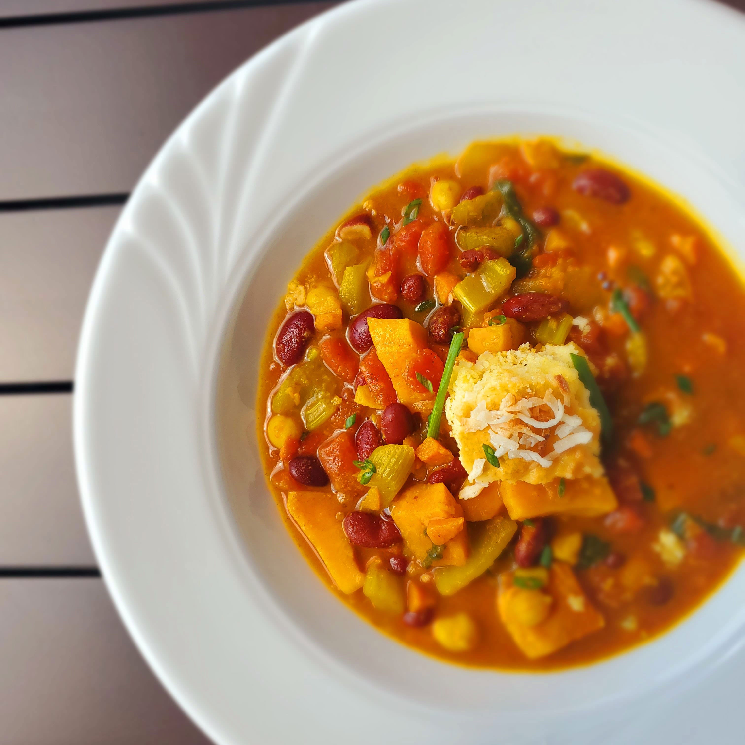 Mediterranean sweet potato stew served with a coconut cornbread web